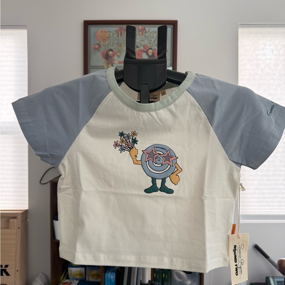 Cream and Gray/Blue a women’s Tee with Cartoon Graphic